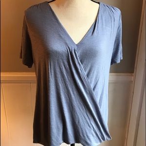 Blue cross over top.